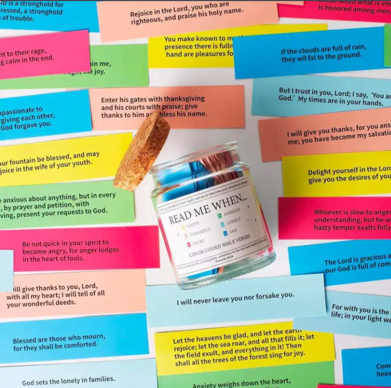 Jar of 'Read Me When' booklets on a colorful background with Bible verses.