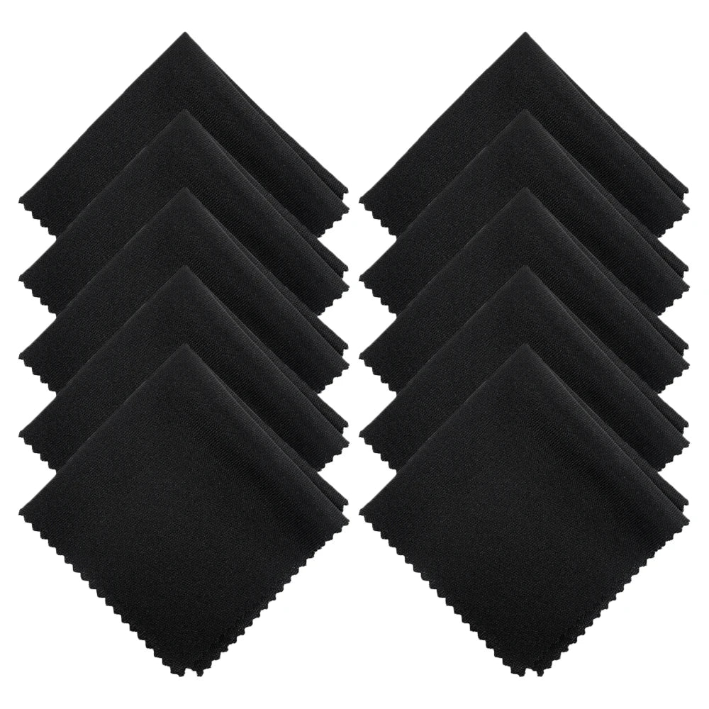 Set of black napkins arranged in a diamond pattern on a white background