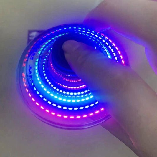 Person holding a coiled LED strip with multicolor lights