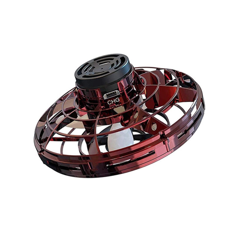 Red and black handheld spinner toy on a white background