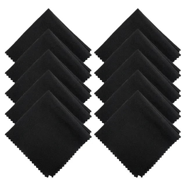 Set of black napkins arranged in a diamond pattern on a white background